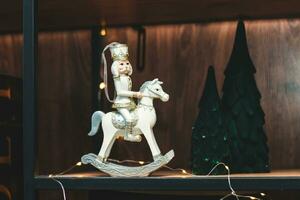 A wooden soldier in a Christmas theme, a statue for room decoration photo