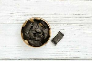 nicotine pouches tobacco, black snus on the background photo