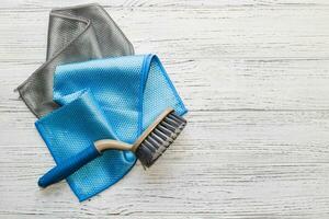 Blue and gray cloth with a special texture for cleaning glasses and dishes for household cleaning. photo