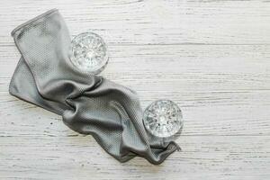 a rag with a special texture for cleaning glass glasses and dishes for home use. photo