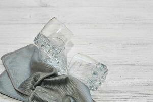 a rag with a special texture for cleaning glass glasses and dishes for home use. photo