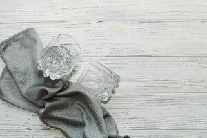 a rag with a special texture for cleaning glass glasses and dishes for home use. photo