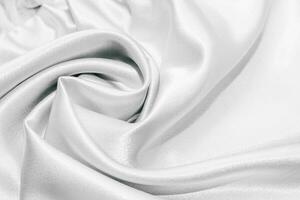 White silk fabric texture, Satin fashion Background for content. photo