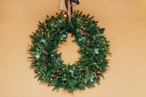 Golden Christmas tree wreath, item for room decoration photo