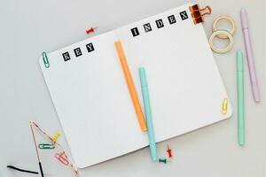 Filling in the diary, the inscription Key, Index in a dot notebook photo