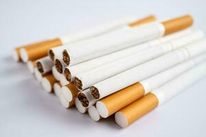 Cigarette, tobacco in roll paper with filter tube, No smoking concept. photo
