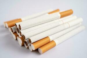 Cigarette, tobacco in roll paper with filter tube, No smoking concept. photo