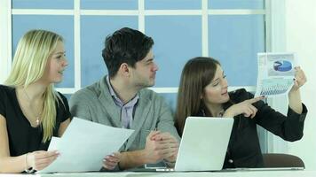 Smiling businessman and Project manager listens report video