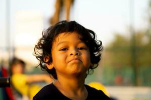 Close Up portrait of Asian boy toothache emotion, medicine concept photo