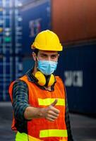 Male workers in the transport industry have hygienic masks photo