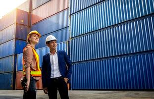 Two foreman, a woman and a man, stand together and look forward photo