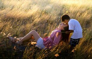 The son showed love for his mother. By kissing on the forehead photo