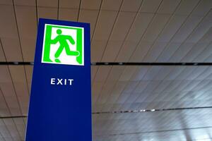 Exit information board sign at airport or train station photo