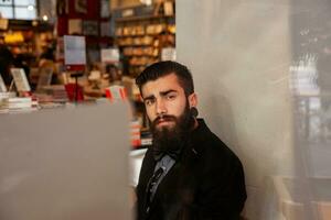 young businessman taking a break in a cafe photo