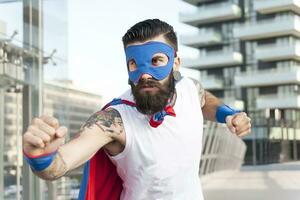 young hipster superhero fights evil photo