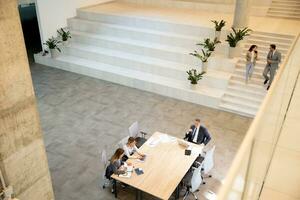 Aerial view at young startup team working in the office photo