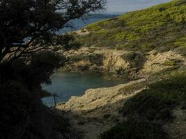 Langoustier red beach in porquerolles island france panorama landscape photo