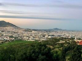 the city of escape from the top of a hill photo