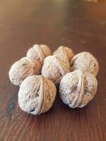Scene of walnuts on a table photo