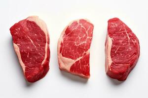 Three four pieces of raw steak isolated on a white background,AI Generated photo