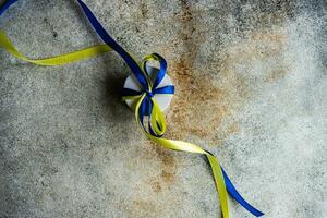 Blue and yellow ribbons in Ukrainian flag colors photo