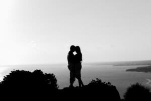 silhouette happiness and romantic scene of love couples partners photo