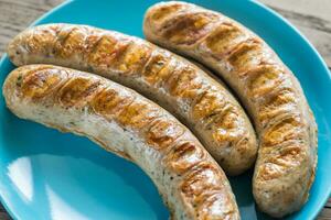 Grilled sausages closeup photo