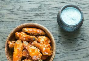 Bowl of buffalo chicken wings photo