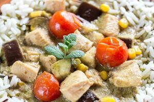 Thai green chicken curry with mix of white and wild rice photo