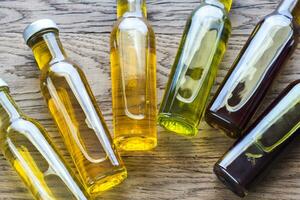 Bottles with different kinds of vegetable oil photo