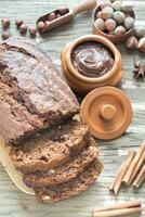 Loaf of banana-chocolate bread with chocolate cream photo