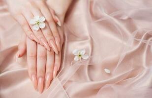 Elegant pastel pink natural manicure. photo