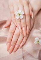 Elegant pastel pink natural manicure. photo