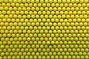 Abstract dots background in yellow colors. photo