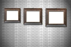 Wooden frame on brick wall background photo
