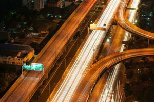 the light trails on the road photo