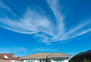 The roof of the house is in the weather photo