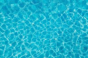 water swimming pool texture top view, Blue ripped water in swimming pool, abstract summer banner background water waves in sunlight with copy space photo