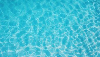 water swimming pool texture top view, Blue ripped water in swimming pool, abstract summer banner background water waves in sunlight with copy space photo