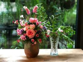 Flower in the vase in restaurant photo