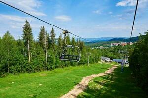 Mountains with open cable cars lift, Karpacz, Poland photo