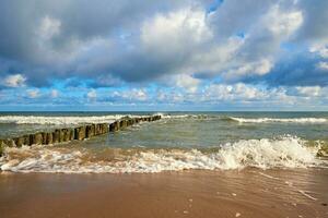 Baltic sea coastlineagainst beautiful cloudy sky photo