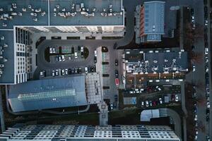 Residential building with parked cars photo