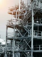 Pipelines and towers view of oil and gas refinery photo