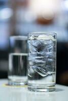 Blue color tone of Drinking water and blurred background. photo