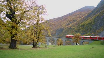 The red tourist train of the Swiss Alps in Brusio video