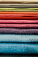 a stack of colorful fabric photo