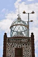 the lighthouse on the island of galapagos photo