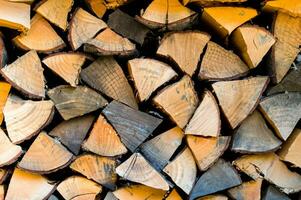 close up pile of chopped firewood. photo