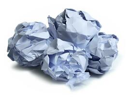 crumpled sheet of paper with crumpled papers photo